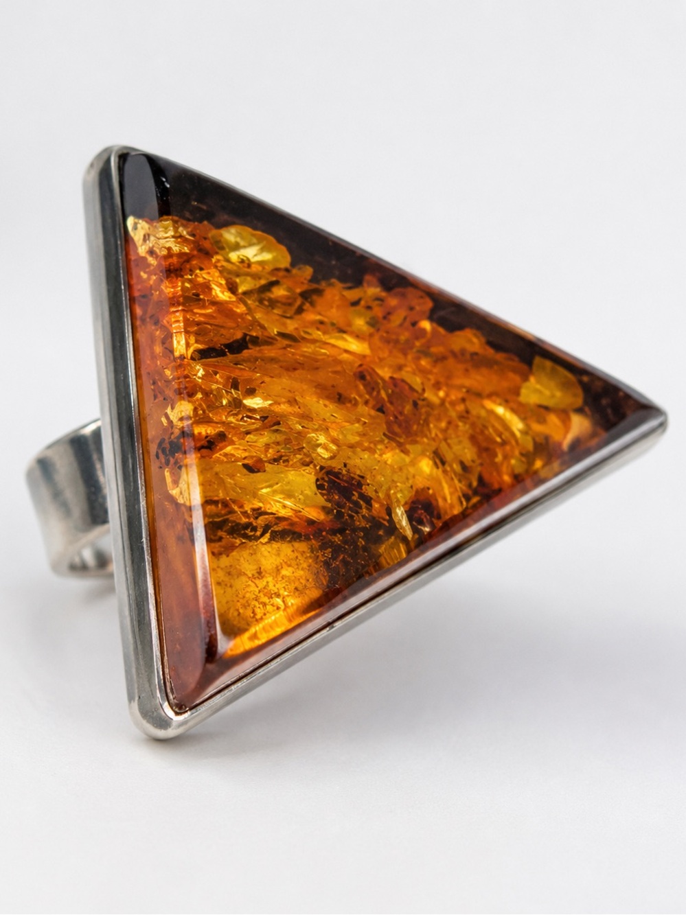 Vintage Soviet silver ring with natural amber, bold geometric design.
